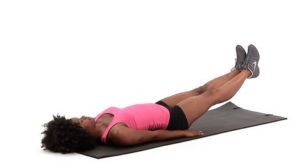 image of woman on back with both legs lifted for double leg stretch